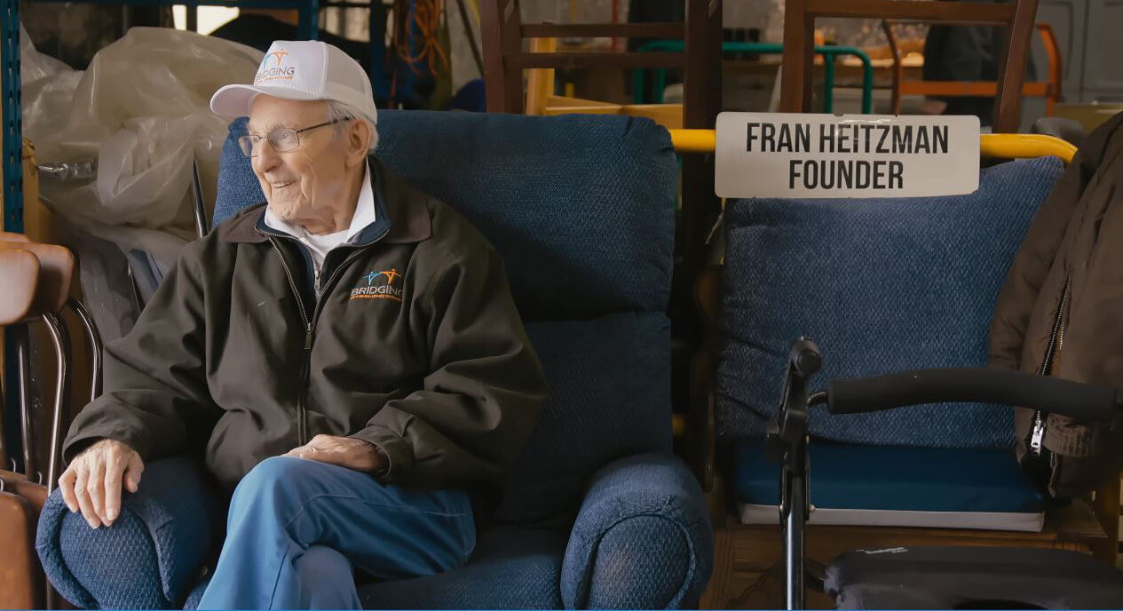 Photo of Fran smiling at the dock doors at Bridging.