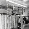 Mattresses in warehouse.