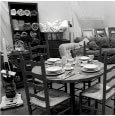 Table and chairs with silverware.